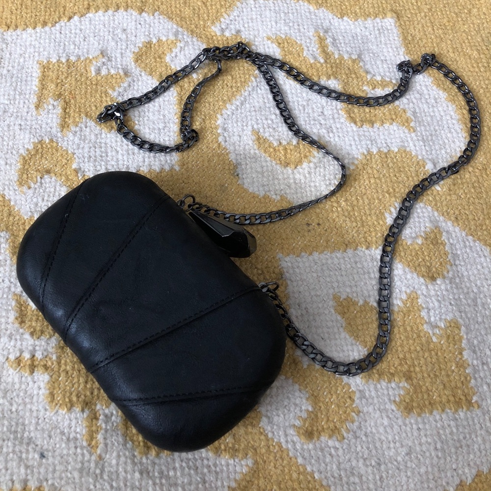 Small clutch with jewel shaped clasp